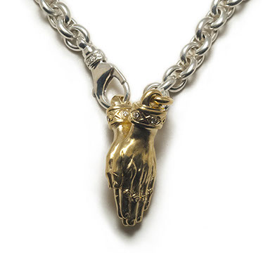 The Namaste with Tristan and Isolde Cuff 750 Yellow Gold with VS Diamonds.  Brage 925 Sterling Silver chain with Tristan and Isolde Clasp