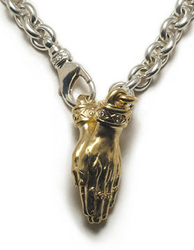 The Namaste with Tristan and Isolde Cuff 750 Yellow Gold with VS Diamonds.  Brage 925 Sterling Silver chain with Tristan and Isolde Clasp