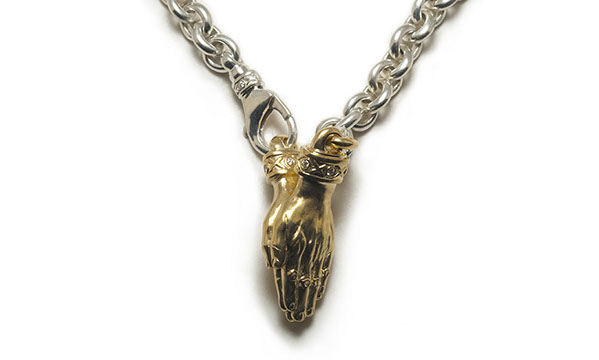 The Namaste with Tristan and Isolde Cuff 750 Yellow Gold with VS Diamonds.  Brage 925 Sterling Silver chain with Tristan and Isolde Clasp